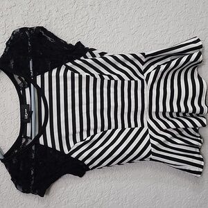 Black and white striped peplum top